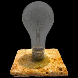 Circa 1940s GE Antique Large Photoflash Wire Filled Lamp Mounted On Travertine